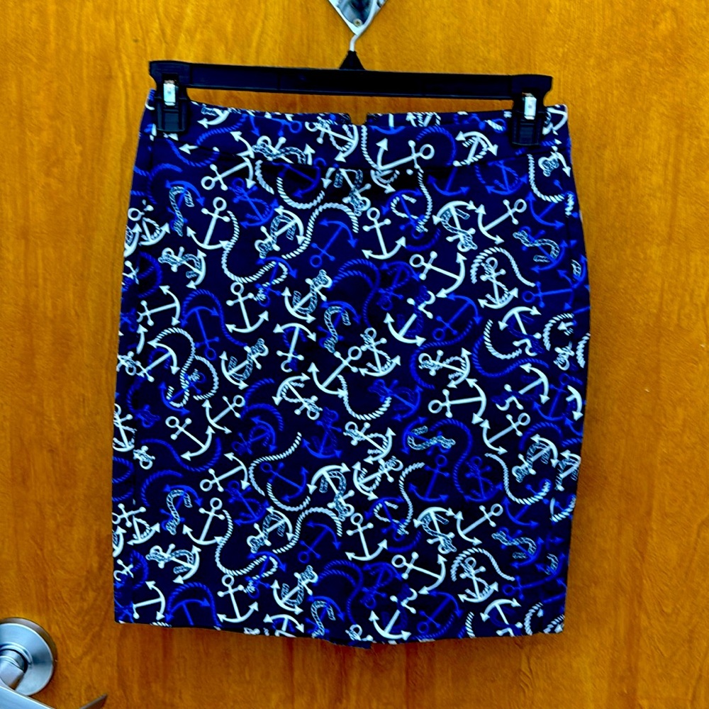 Mid length blue and white skirt with anchors